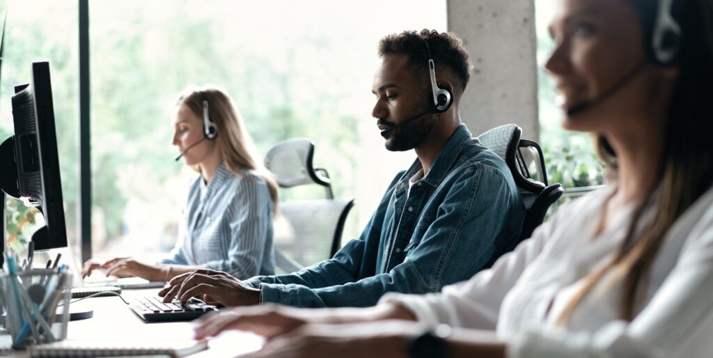 Team,Of,Business,People,Working,In,A,Call,Centre,On